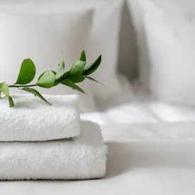 Hotel Linens Green Shutterstock 2204673857